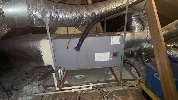Attic air handler with insulated ductwork